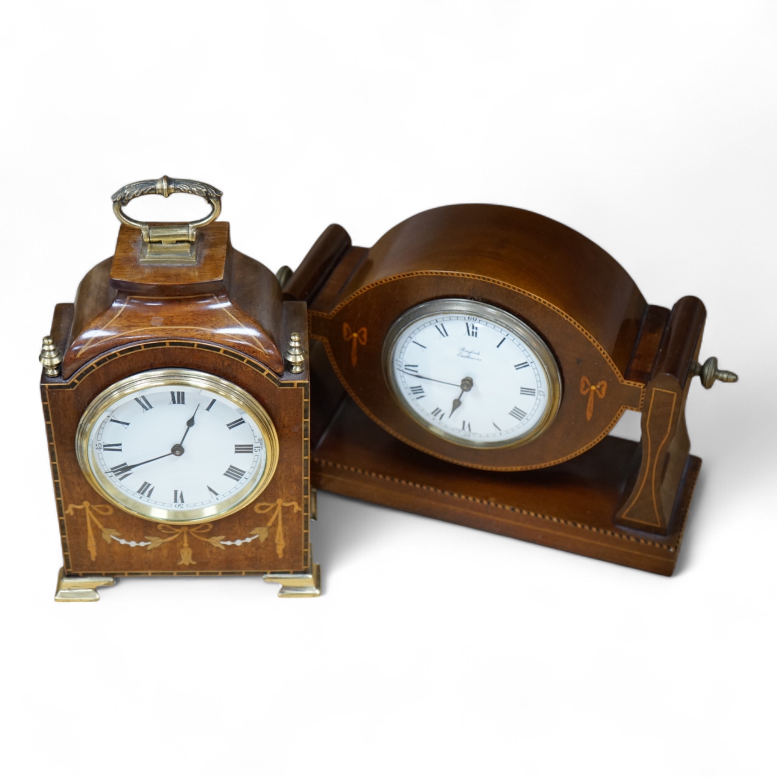 Two Edwardian inlaid mantel clocks, one signed Brufords, Eastbourne. Tallest 22cm high. Condition - good